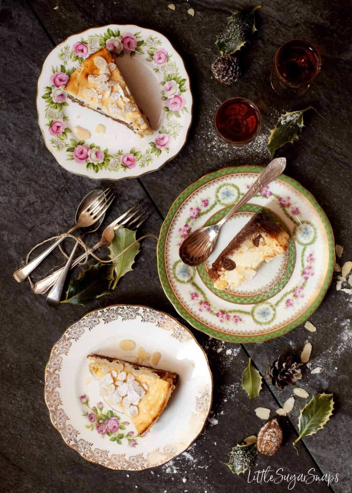 Slices of Italian Ricotta Cheesecake on vintage tea plates.