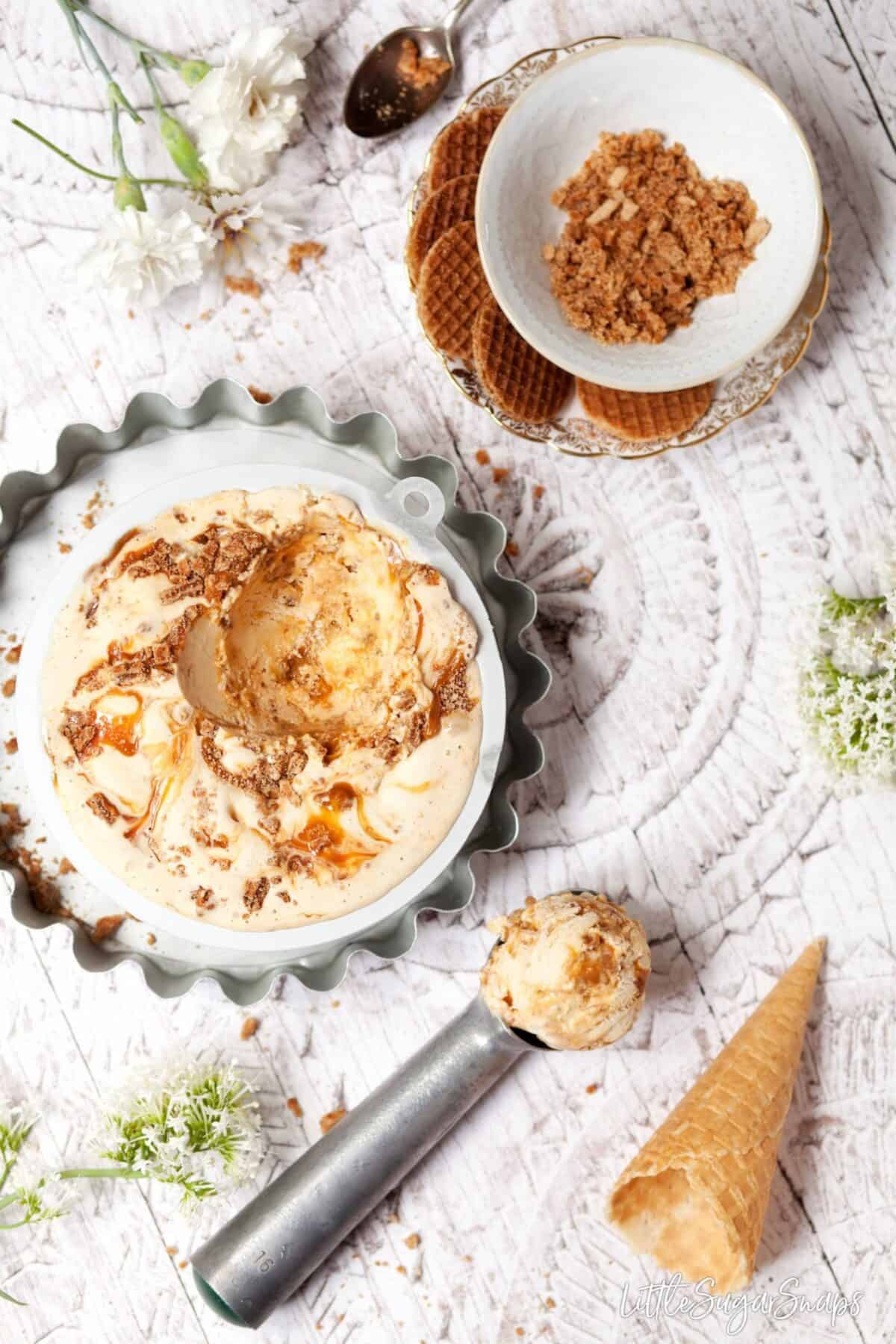 Stroopwafel ice cream being served from a metal container