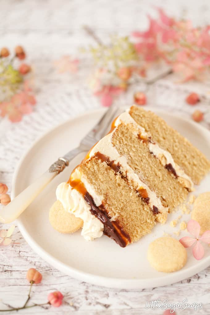 a slice of millionaire cake on a plate.