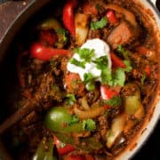 vegetarian rogan josh curry with aubergine and black lentils