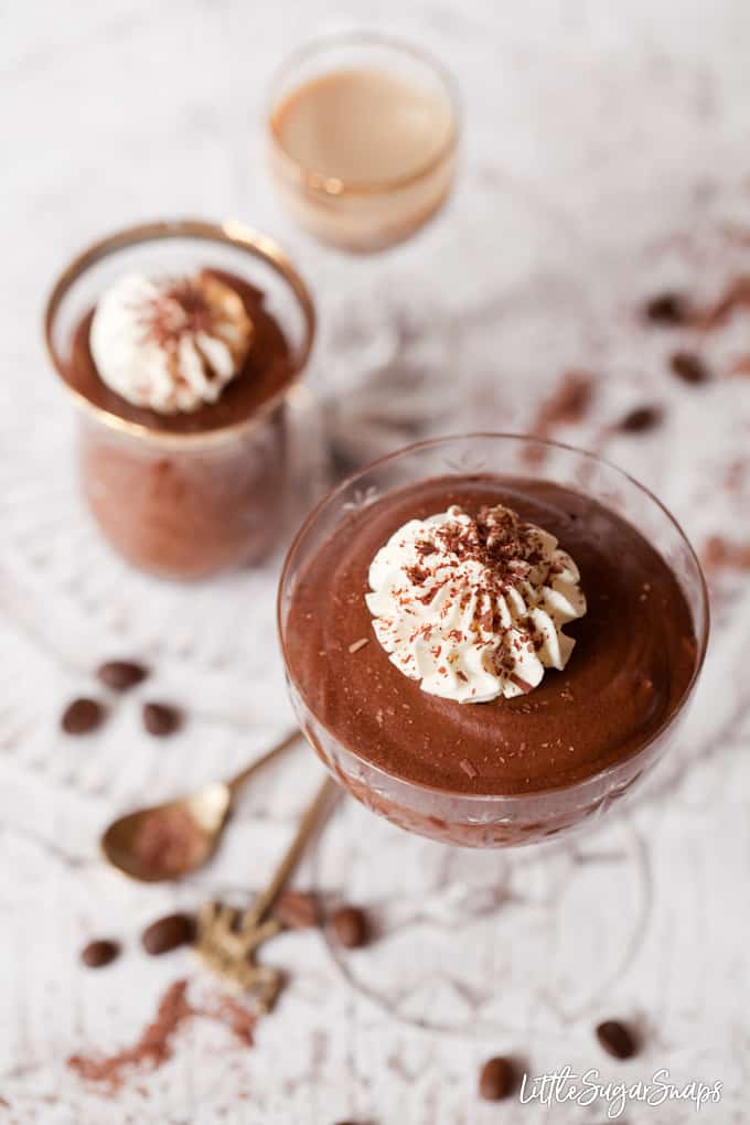 Baileys chocolate mousse in 2 glasses topped with cream and chocolate. 