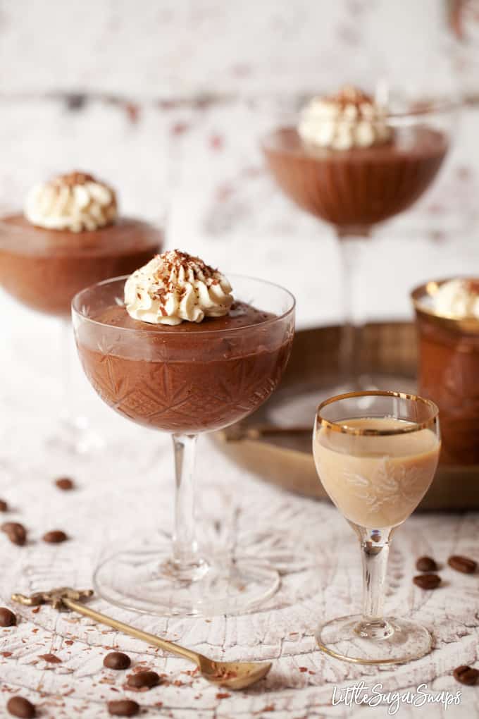 A glass of Baileys chocolate mousse and a glass of baileys Irish Cream.