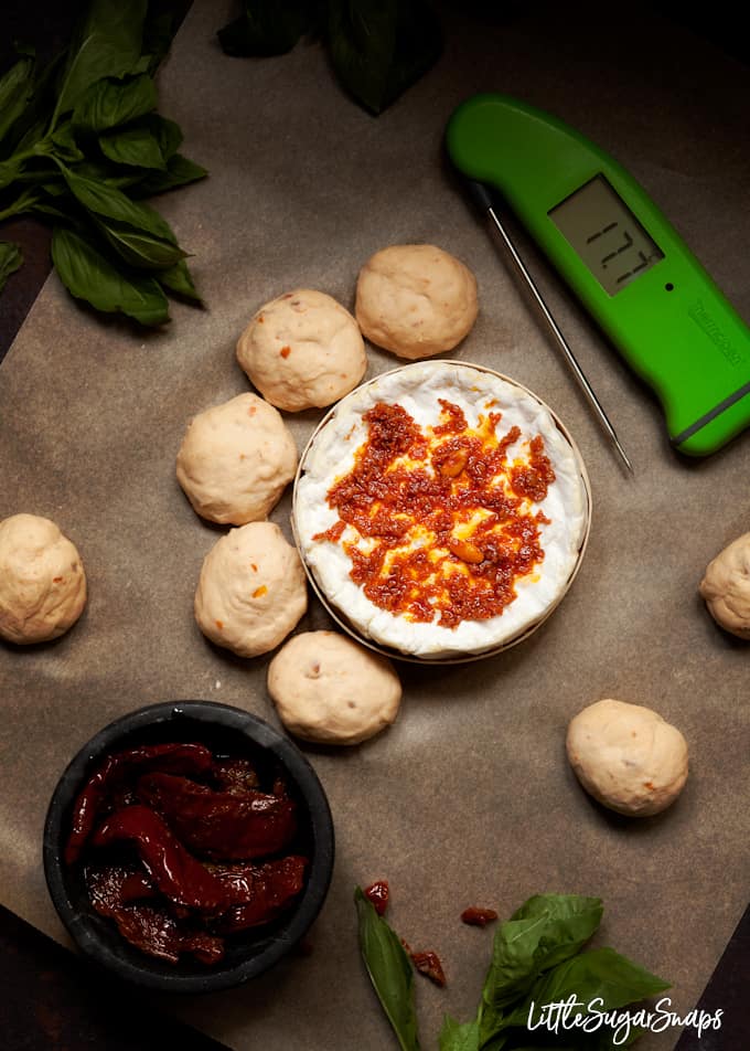 step by step process shot of assembling a dough ball and baked camembert wreath