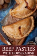 Beef and horseradish pasties on a wooden board - pinterest image