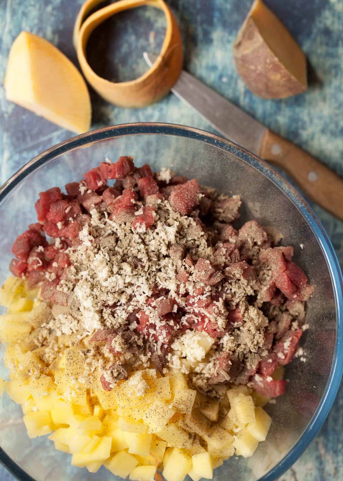 ingredients for traditional beef pasty filling in a bowl