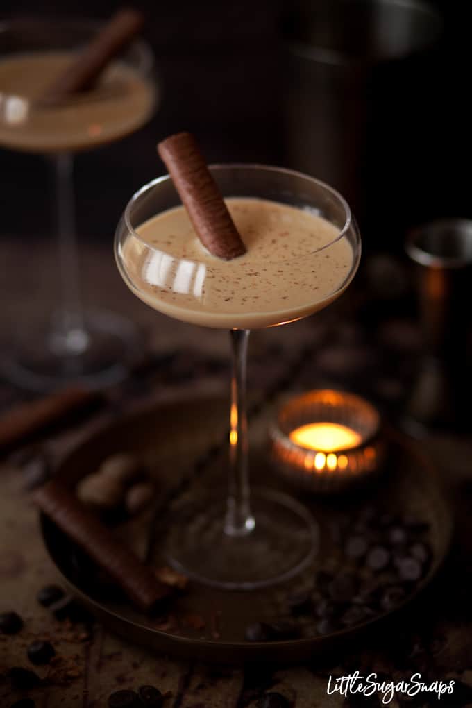 Coffee Brandy Alexander cocktail with a chocolate wafer and chocolate flakes to decorate