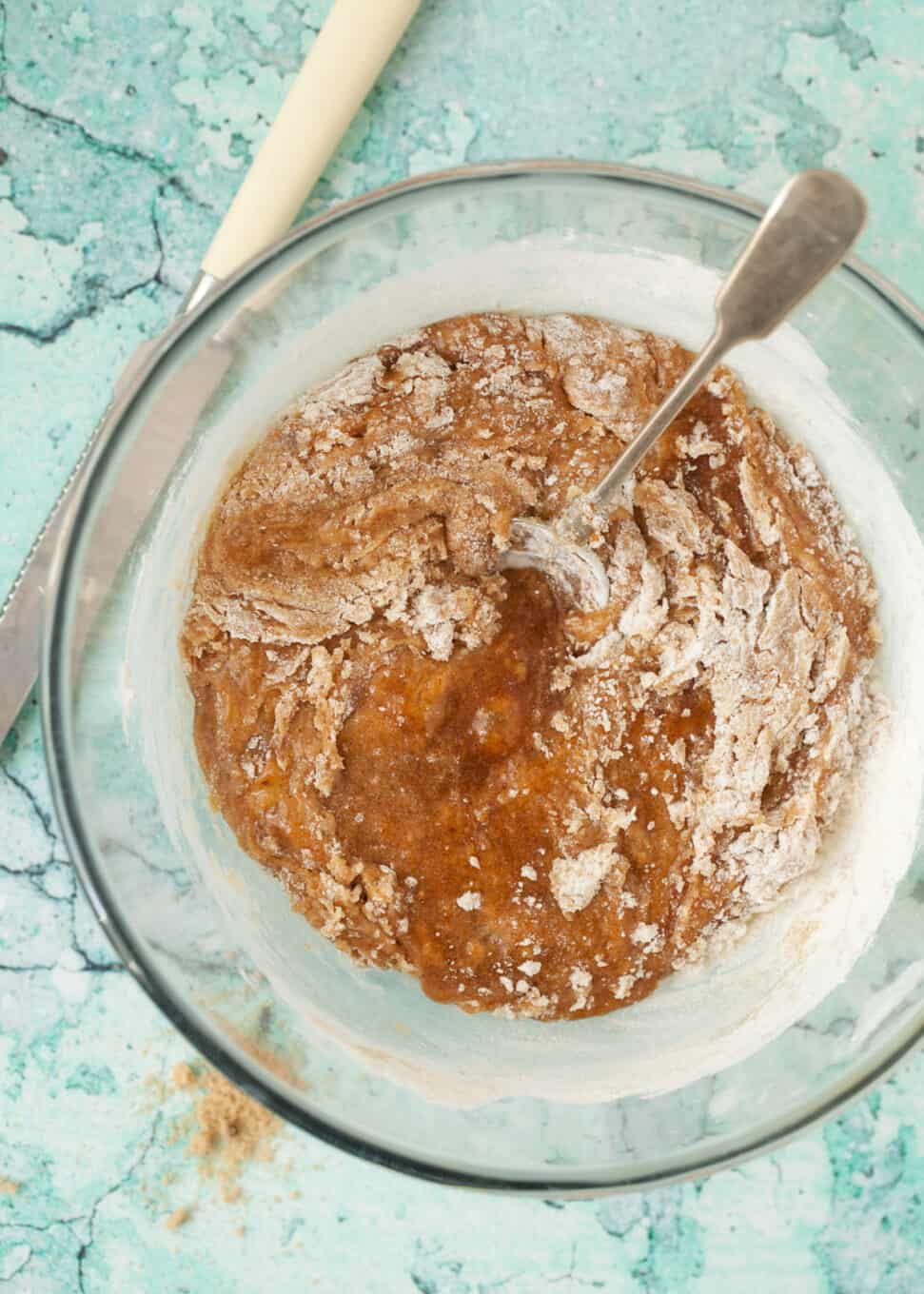 Step by Step process shot: mixing flour into batter