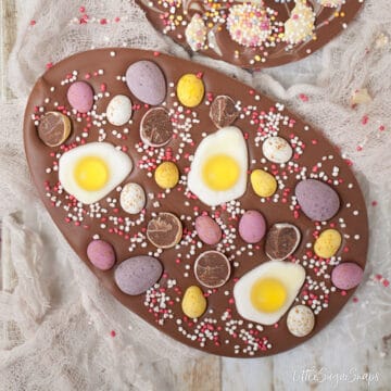 Homemade Easter Eggs with mini eggs and jelly sweet toppings