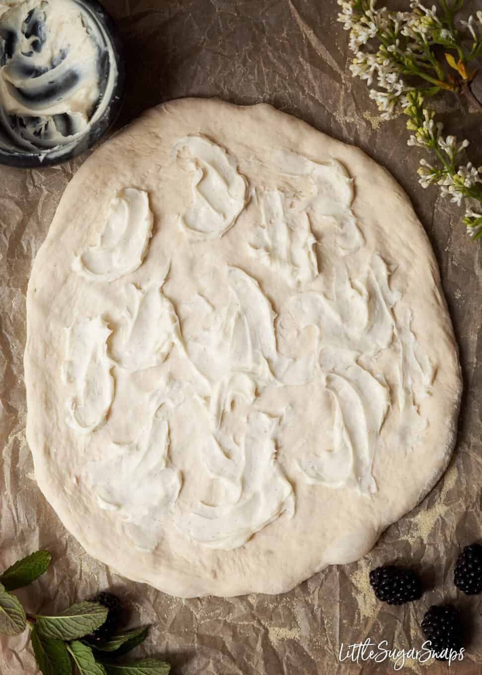 sweetened mascarpone cheese spread onto a pizza base