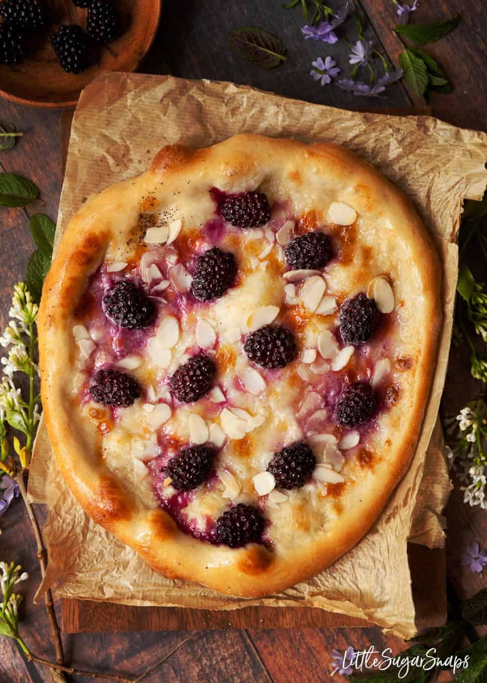 process shot for recipe for dessert pizza with mascarpone and blackberries