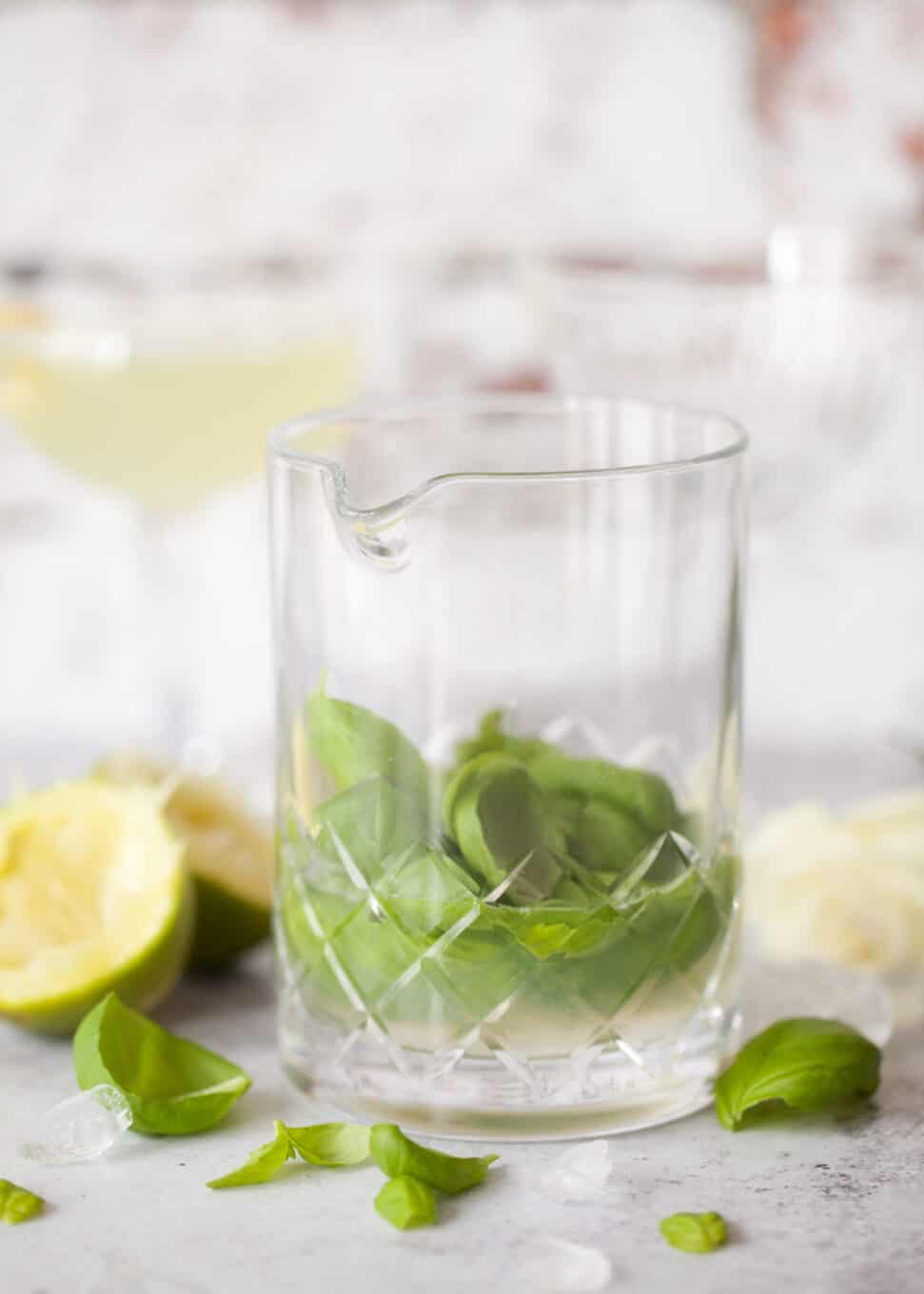 Making a herb cocktail using fresh herbs