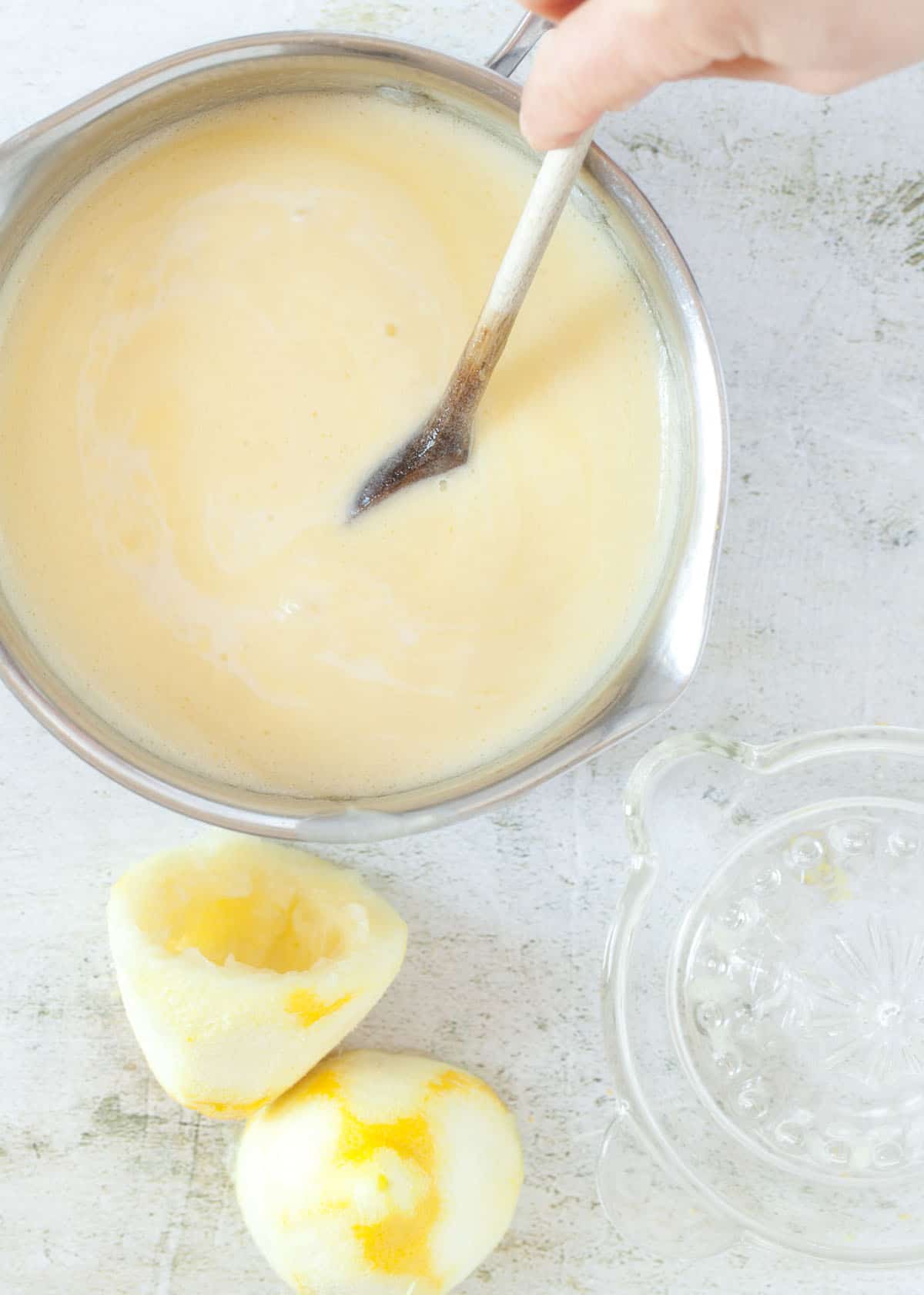 Process shot - stirring lemon juice into cream