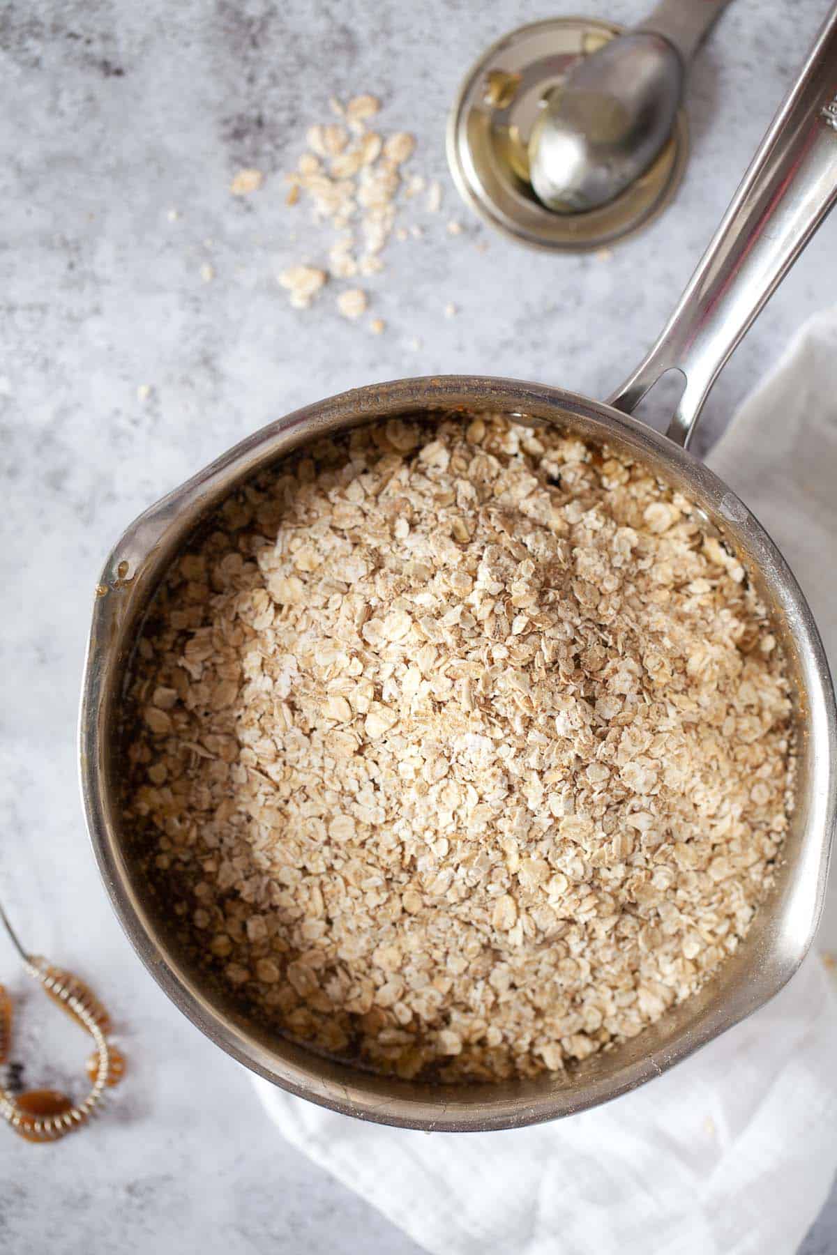 Oats for flapjack in a pan ready to mix into the melted ingredients