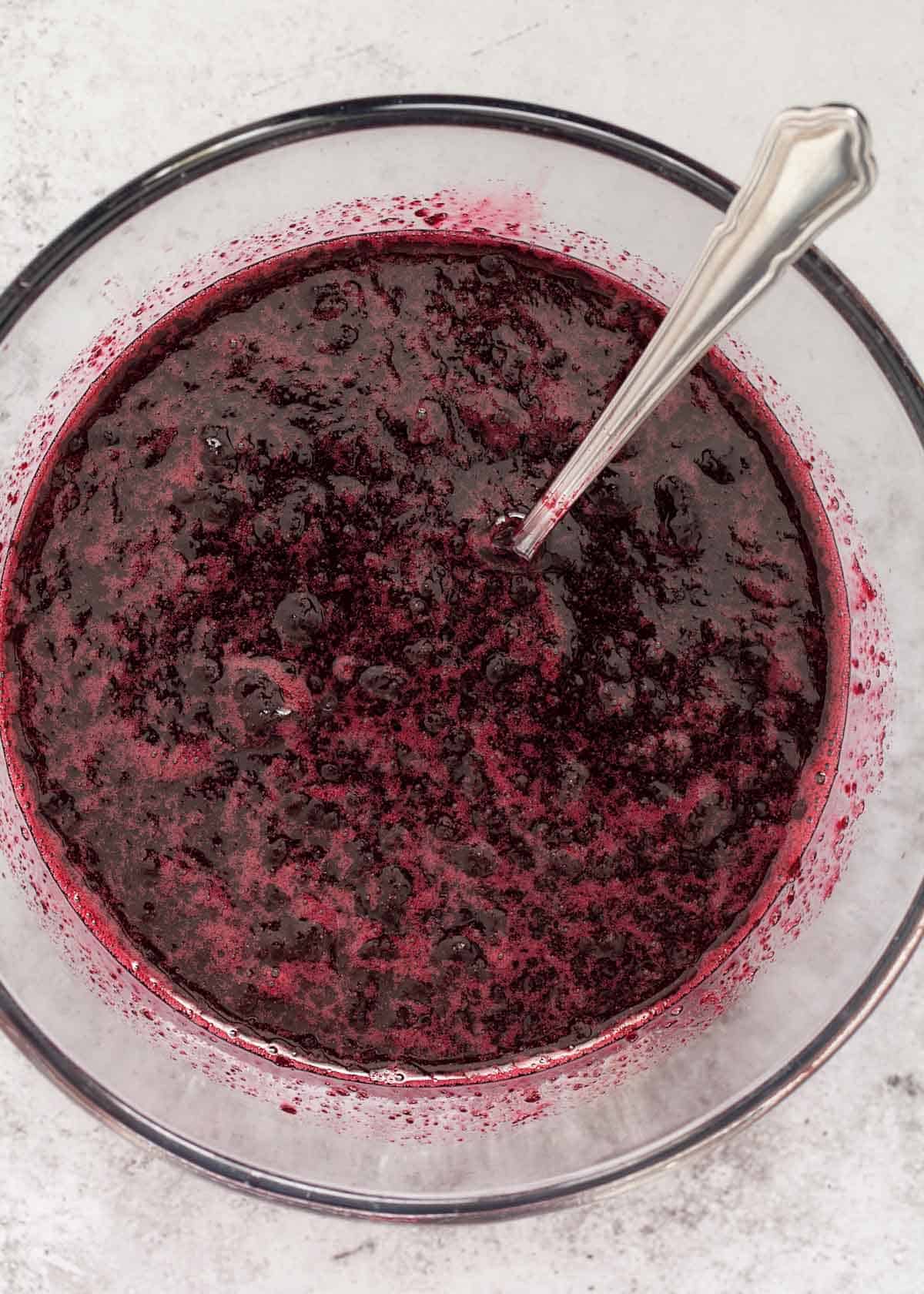 Blackcurrant syrup in a bowl