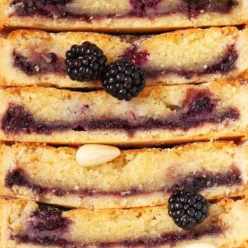 Close up of almond frangipane tart with blackberries