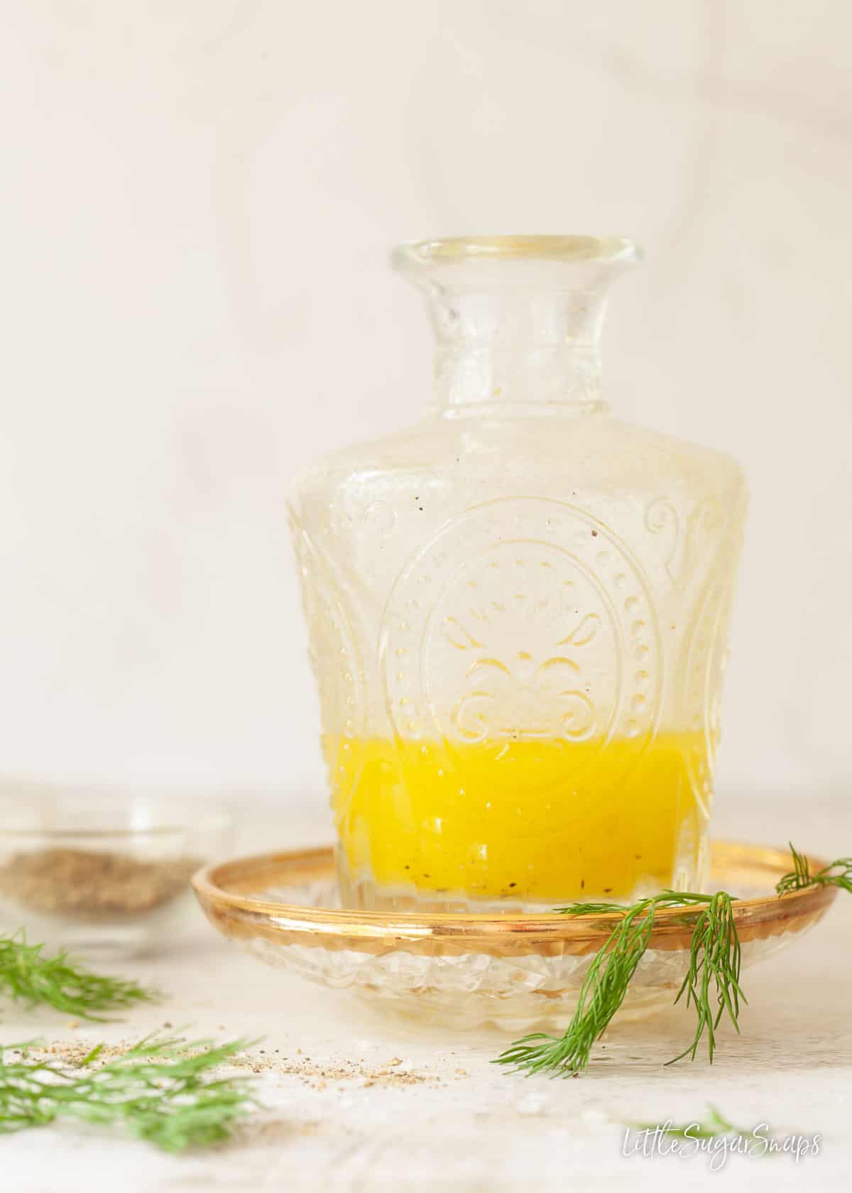 A bottle of vinaigrette dressing for a salad