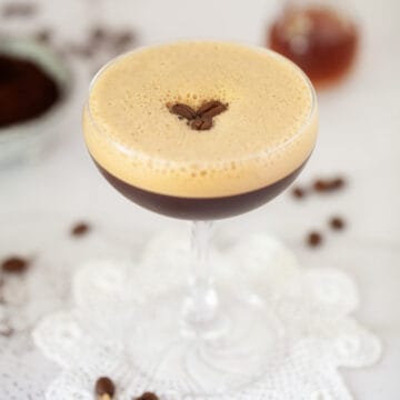 caffè shakerato (Italian iced coffee) garnished with coffee beans