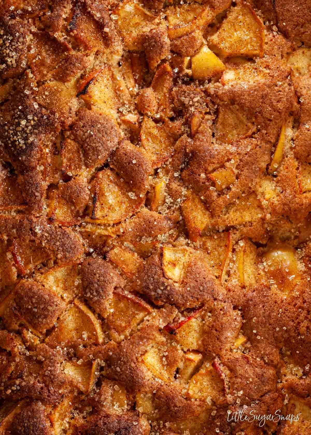 Close up of the top of an apple cake once baked