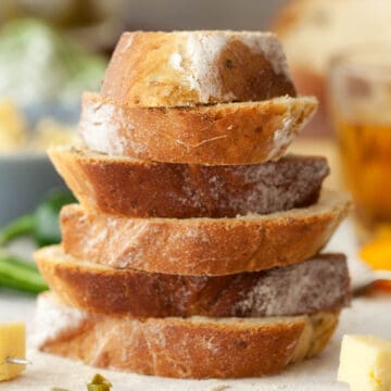 A stack of slices of crusty bread