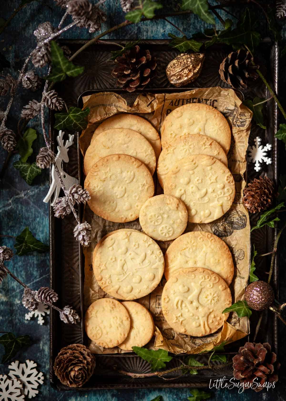 Embossed lemon shortbread cookies on vintage baking trays