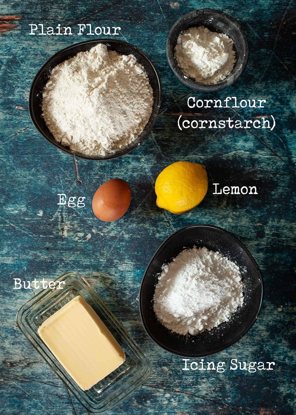 Ingredients for lemon shortbread cookies with text overlay