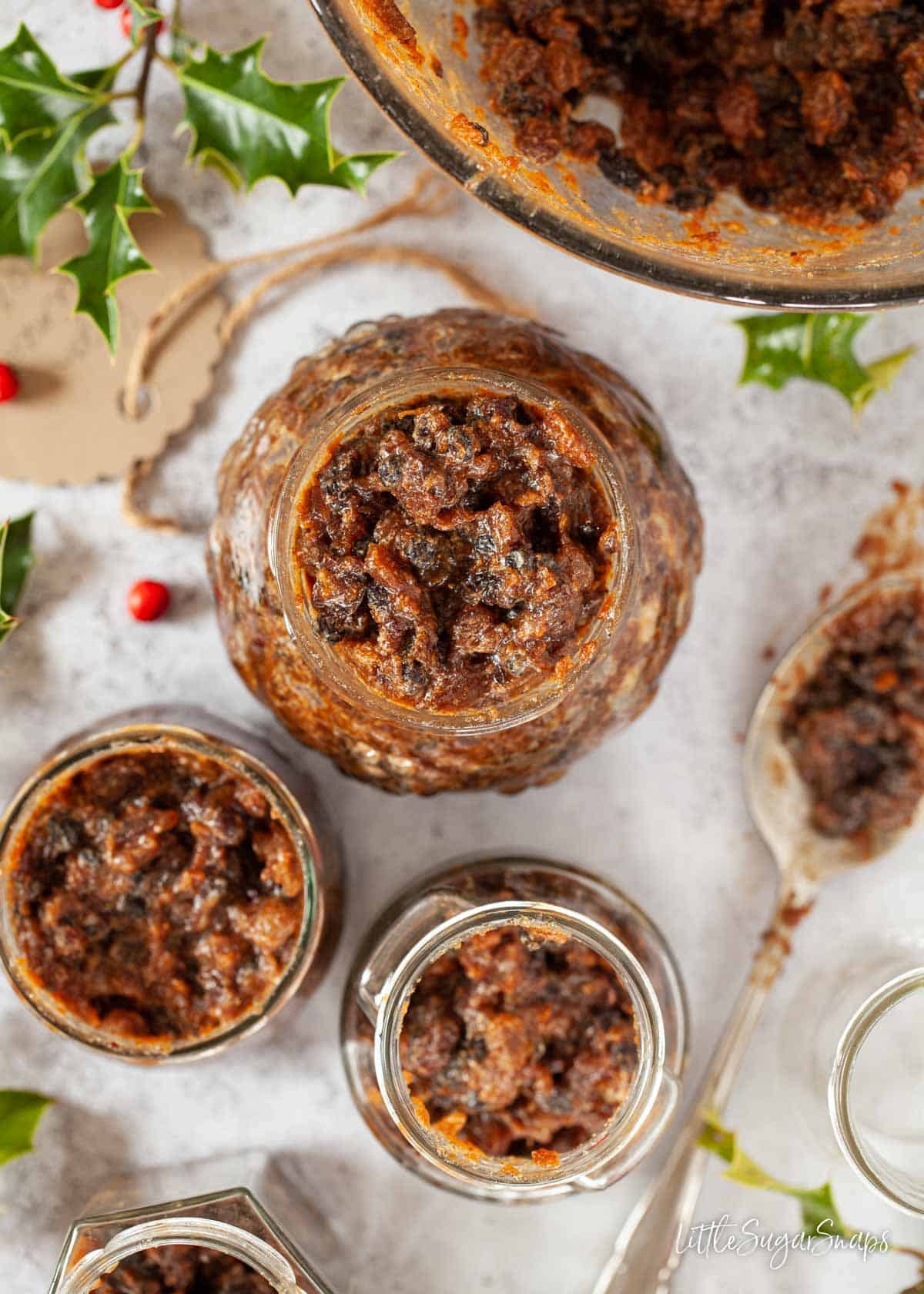 Homemade Vegan mincemeat being put into sterilised jars.