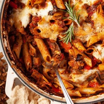 A pan of pasta al forno with aubergine ragu