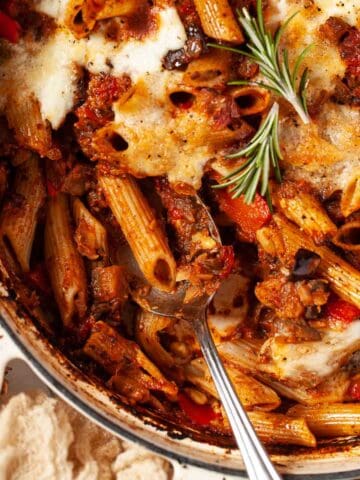 A pan of pasta al forno with aubergine ragu