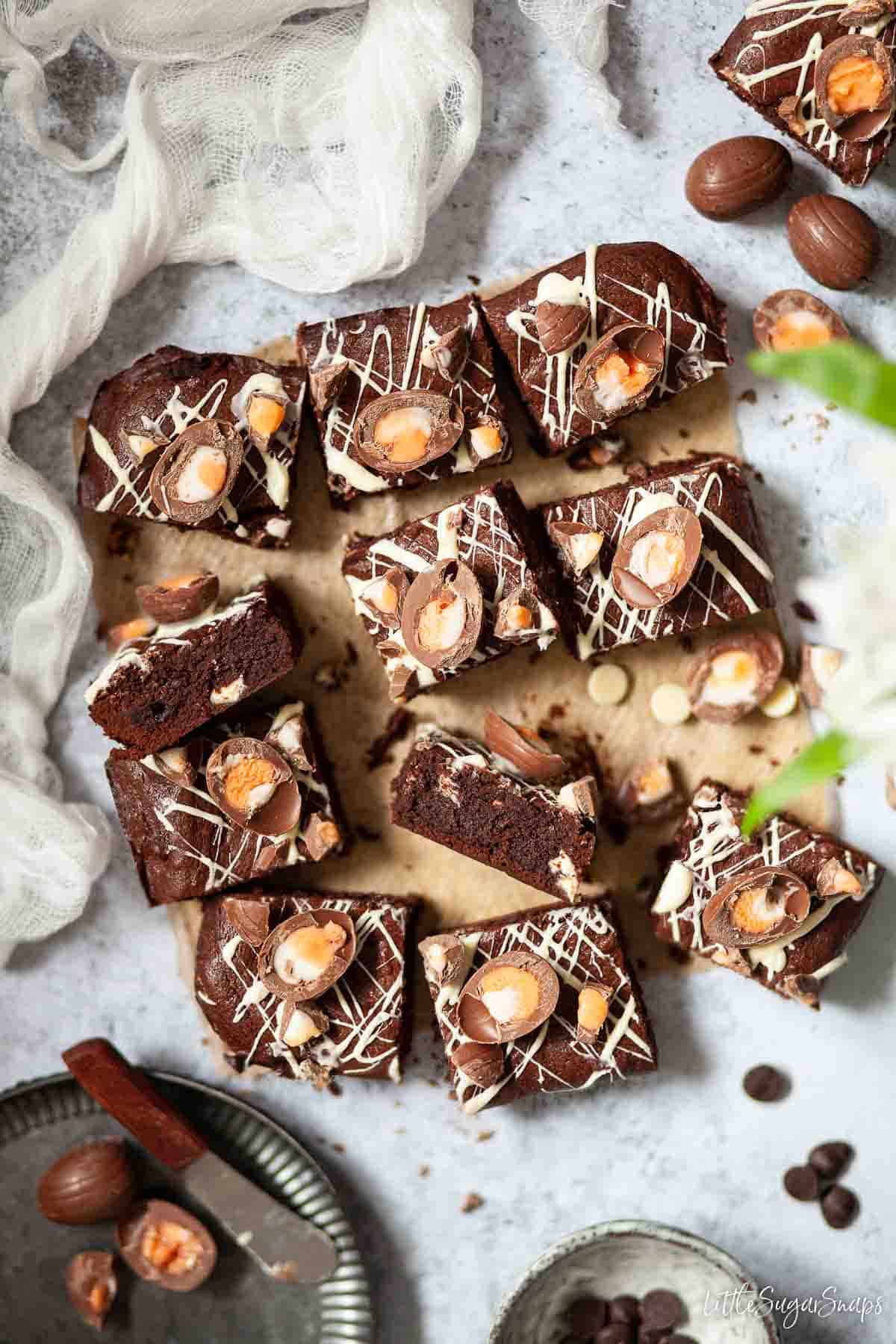 Overhead view of a batch of freshly cut creme egg brownies