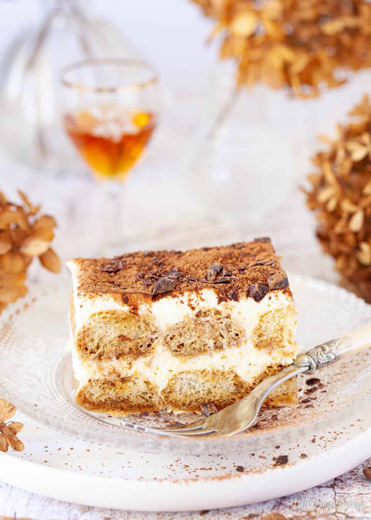 A slice of authentic tiramisu made with an egg and mascarpone cream