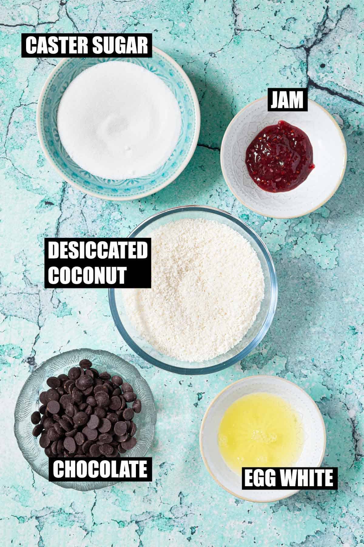 Ingredients for coconut macaroons in bowls with text overlay