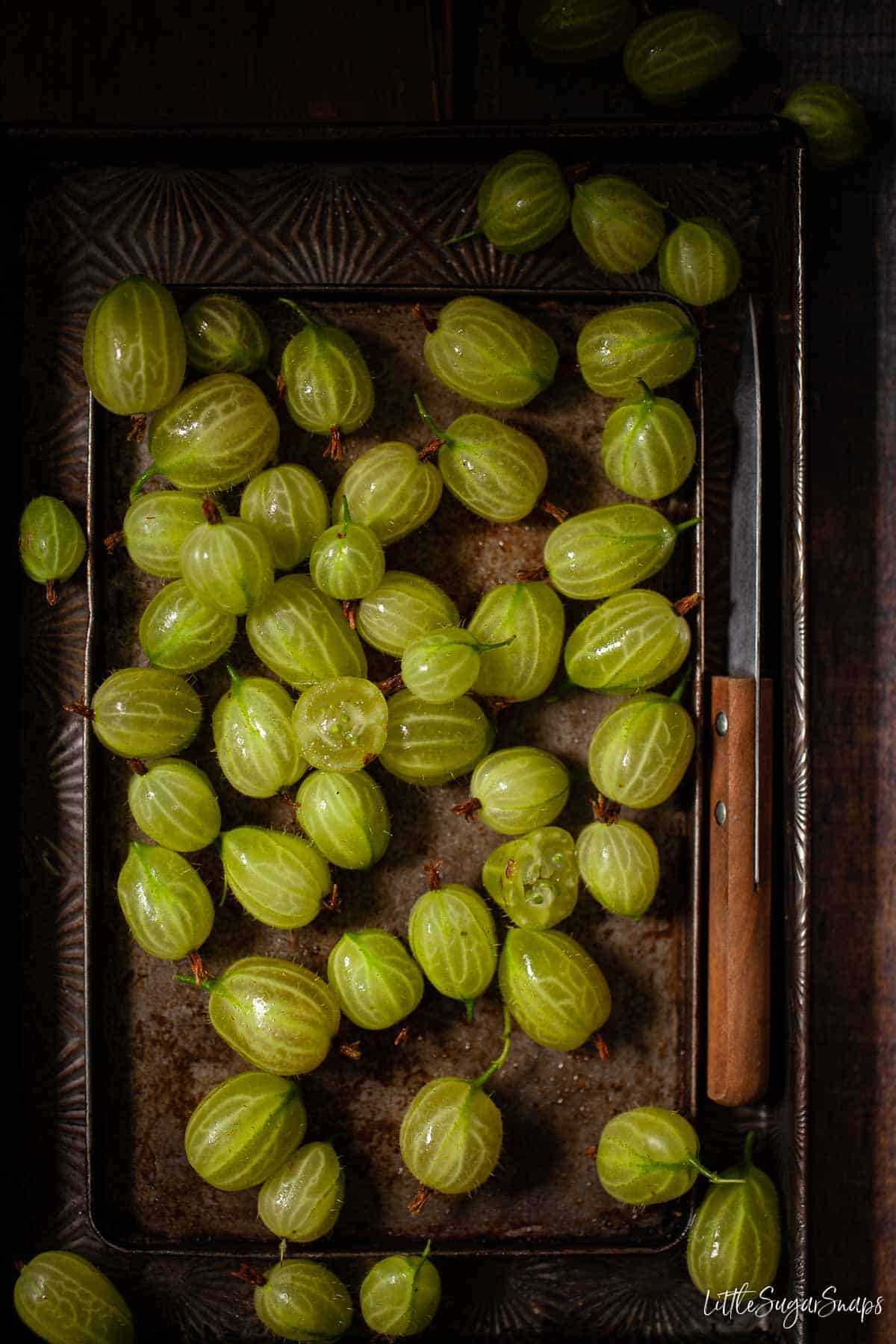 Gooseberries on a baking tin