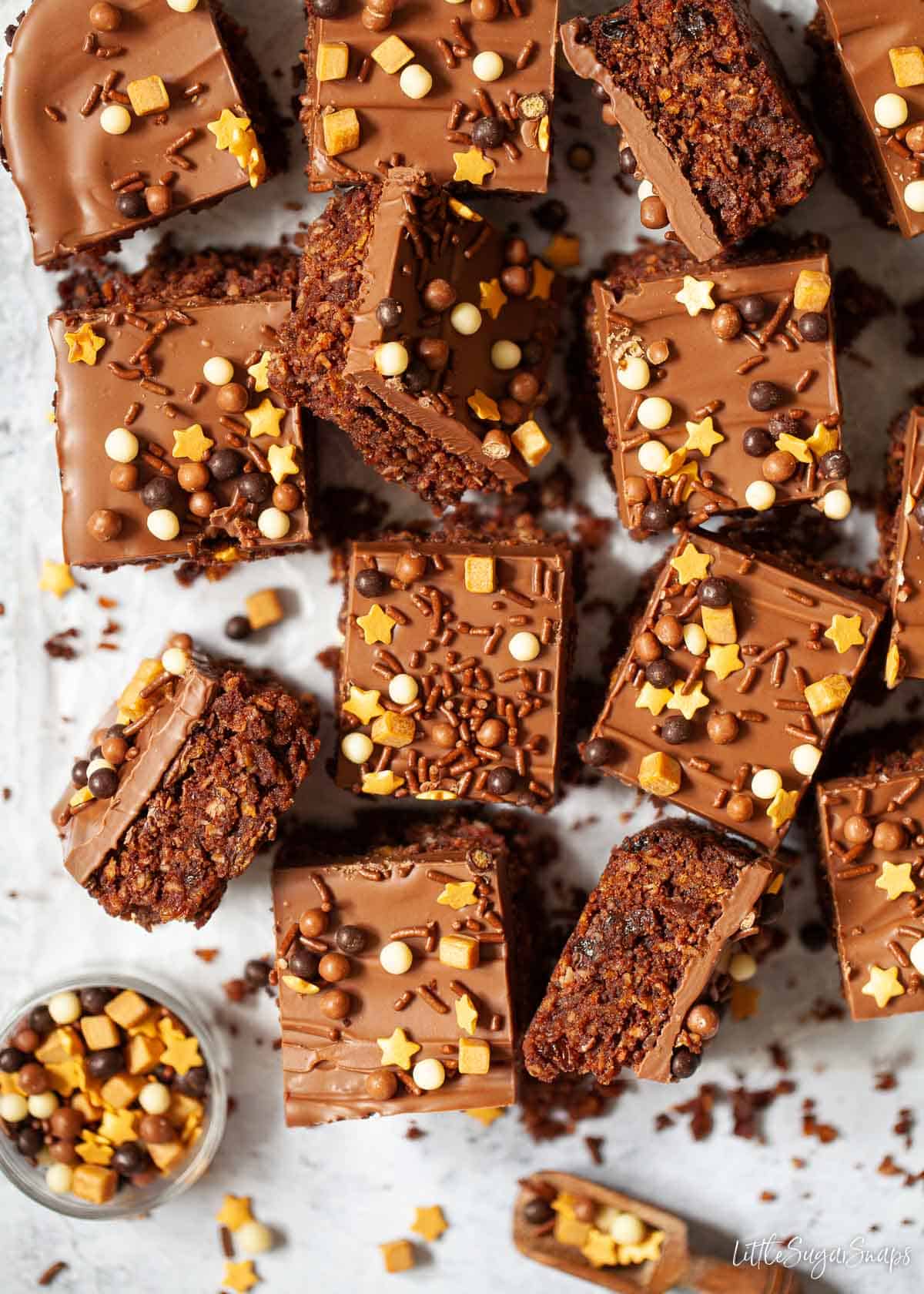 Coconut chocolate slices topped with chocolate and sprinkles