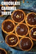 A plate of chocolate caramel tarts with text overlay.