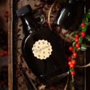 Close-up of a bottle of homemade gingerbread syrup for coffee and other drinks.