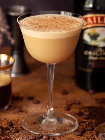 An espresso martini with Baileys topped with grated chocolate.