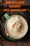 A mug of orange flavoured hot chocolate with text overlay