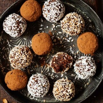 Close up of chocolate date and coconut balls.