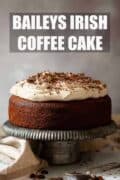 Baileys Irish coffee cake topped with whipped cream with text overlay.