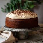 Closeup of a Baileys irish coffee cake topped with whipped cream.