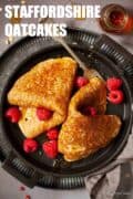 Sweet Staffordshire oatcakes with golden syrup and raspberries plus text overlay.