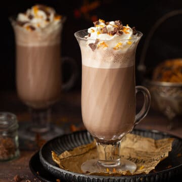 close up of a terrys chocolate orange hot chocolate drink.