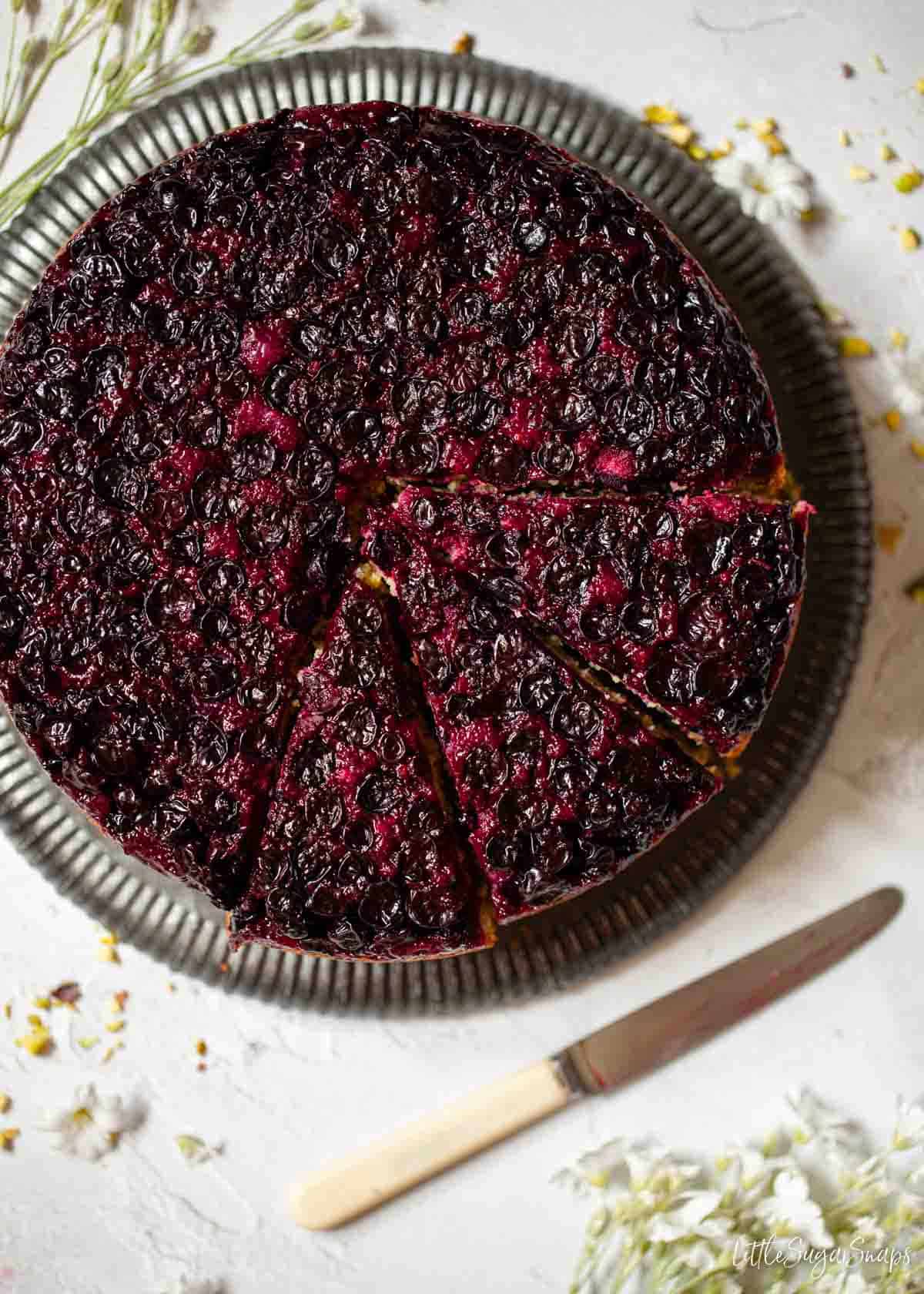 Overhead view of a blackcurrant dessert cake.