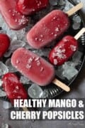 Small and full-sized cherry popsicles with crushed ice cubes with text overlay.