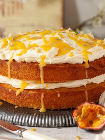 A passion fruit curd cake with mascarpone cream topping.