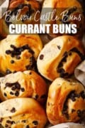 Close up of unglazed currant buns with text overlay.