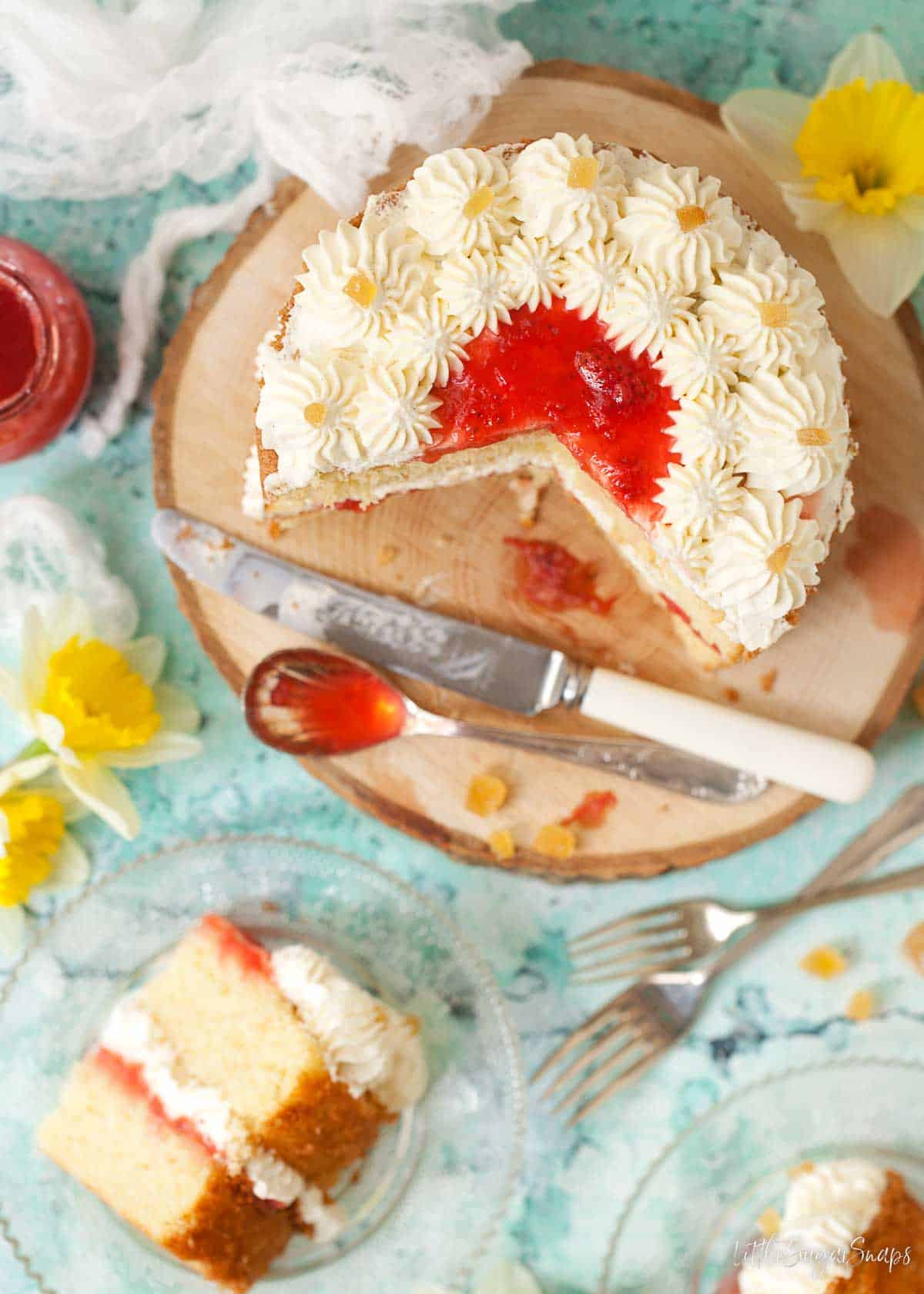 Overhead view of a dessert filled with jam and cream.