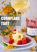 A slice of school cornflake tart with custard plus text overlay.