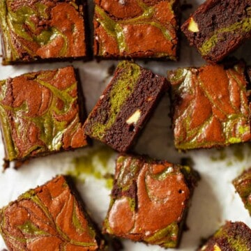 Close-up of squares of chocolate matcha brownies.