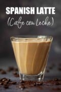 A glass of Spanish latte with text overlay.